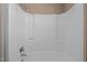 Clean, white shower with updated fixtures and built in soap dishes at 41 Rock Bluff Ln, Kittrell, NC 27544