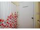 Functional bathroom featuring a colorful shower curtain and ample space, offering both privacy and convenience at 4105 Lassiter Rd, Wake Forest, NC 27587