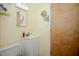 Bathroom featuring a vanity, toilet, and bright vanity lighting at 4105 Lassiter Rd, Wake Forest, NC 27587