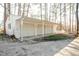 Spacious three-car garage exterior, offering ample parking and storage at 4105 Lassiter Rd, Wake Forest, NC 27587