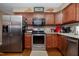 Well-equipped kitchen featuring stainless steel appliances and ample cabinet space at 4105 Lassiter Rd, Wake Forest, NC 27587