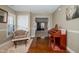 Sitting room with piano leading to larger living room space at 4105 Lassiter Rd, Wake Forest, NC 27587
