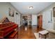 The open living room showcases hardwood floors and seamless access to the kitchen at 4105 Lassiter Rd, Wake Forest, NC 27587