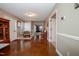 Inviting living room with neutral walls, and view into other rooms for easy movement throughout the home at 4105 Lassiter Rd, Wake Forest, NC 27587