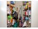 Well-organized storage closet with wire shelves and various cleaning supplies and household items at 4105 Lassiter Rd, Wake Forest, NC 27587