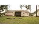 Exterior rear of home with screened porch, wooden deck, and backyard at 45 Crabtree Ct, Fuquay Varina, NC 27526