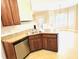 Kitchen featuring stainless appliances, wooden cabinets, and center island, perfect for cooking at 45 Crabtree Ct, Fuquay Varina, NC 27526