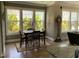 Bright dining area with large windows and hardwood floors at 465 Claremont Dr, Chapel Hill, NC 27516