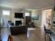 Cozy living room with fireplace, hardwood floors, and natural light at 465 Claremont Dr, Chapel Hill, NC 27516