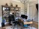 Office space featuring shelving and a neutral color palette at 465 Claremont Dr, Chapel Hill, NC 27516