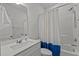 Bathroom featuring a shower/tub, white vanity, and modern fixtures at 5200 Invention Way, Raleigh, NC 27616