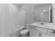 Bathroom featuring a shower, white vanity, and modern fixtures at 5200 Invention Way, Raleigh, NC 27616