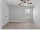 Bedroom with neutral carpet, window, and ceiling fan at 5200 Invention Way, Raleigh, NC 27616