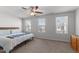 Bedroom with natural light, neutral carpet, and ceiling fan at 5200 Invention Way, Raleigh, NC 27616
