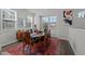 Cozy dining room with seating for six, natural light and stylish decor at 5200 Invention Way, Raleigh, NC 27616