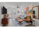 Bright living room with stylish decor, comfortable seating, and modern ceiling fan at 5200 Invention Way, Raleigh, NC 27616