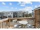 Cozy patio with table and chairs with a view of neighboring homes and the community at 5200 Invention Way, Raleigh, NC 27616