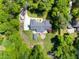 Expansive aerial view of the home and property, showcasing its spacious lot, landscaping, and secluded setting at 5313 Edington Ln, Raleigh, NC 27604