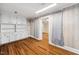 Elegant dining room with hardwood floors, built-in storage and seamless flow into other rooms at 5313 Edington Ln, Raleigh, NC 27604