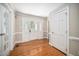 Inviting foyer featuring gleaming hardwood floors, decorative glass door, and neutral paint at 5313 Edington Ln, Raleigh, NC 27604