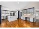 Stylish kitchen with large island, white cabinets, and stainless steel appliances at 5313 Edington Ln, Raleigh, NC 27604
