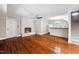 Bright living room with hardwood floors, fireplace and open floor plan to kitchen at 5313 Edington Ln, Raleigh, NC 27604