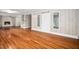 Spacious living room with hardwood floors, fireplace and sliding barn door at 5313 Edington Ln, Raleigh, NC 27604