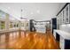 Open-concept living space with hardwood floors, modern kitchen, and natural light at 5313 Edington Ln, Raleigh, NC 27604