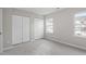 A bright bedroom with a large closet and window at 5340 Big Bass Dr, Raleigh, NC 27610