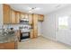 Modern kitchen featuring stainless steel appliances and granite countertops and ample cabinet space at 5340 Big Bass Dr, Raleigh, NC 27610