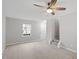 Inviting living room with modern ceiling fan and laminate flooring throughout at 5340 Big Bass Dr, Raleigh, NC 27610
