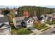An aerial shot of a two-story home featuring an attached garage and well-maintained lawn at 5405 Seaspray Ln, Raleigh, NC 27610