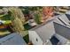 An aerial view showing a home and its well-maintained backyard and detached garage at 5405 Seaspray Ln, Raleigh, NC 27610