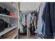 A well-organized walk-in closet with shelving, hanging rods, and ample storage for clothing and accessories at 5405 Seaspray Ln, Raleigh, NC 27610