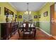 Formal dining area with stylish table set and elegant decor at 5405 Seaspray Ln, Raleigh, NC 27610