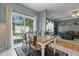 Cozy breakfast table area with view of the backyard and access to living room at 5405 Seaspray Ln, Raleigh, NC 27610
