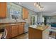 Well-equipped kitchen with stainless steel appliances, tile backsplash and granite countertops at 5405 Seaspray Ln, Raleigh, NC 27610