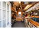 The shed's interior is neatly organized with shelves, workbenches, and tool storage at 5405 Seaspray Ln, Raleigh, NC 27610