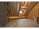 Unfinished attic space showing studs and plywood subfloor at 5450 Hunter Hill Rd, Rocky Mount, NC 27804