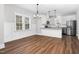 Dining room with hardwood floors and a view of the kitchen at 5450 Hunter Hill Rd, Rocky Mount, NC 27804