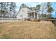 Charming home featuring fenced backyard, screened-in porch, and stairs to backyard at 5450 Hunter Hill Rd, Rocky Mount, NC 27804
