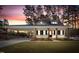 Beautiful home with a covered parking area and a lawn at 5450 Hunter Hill Rd, Rocky Mount, NC 27804