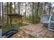 Backyard featuring a unique small bridge and patio area, perfect for outdoor relaxation and enjoyment at 602 N Mineral Springs Rd, Durham, NC 27703