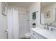 Bright bathroom with a shower, sink, toilet, and a vanity with green accents at 602 N Mineral Springs Rd, Durham, NC 27703