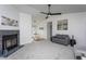 Open-concept living room flowing into a dining area, enhanced by modern lighting at 602 N Mineral Springs Rd, Durham, NC 27703