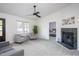 Inviting living room with a view into a bedroom and a cozy seating area at 602 N Mineral Springs Rd, Durham, NC 27703