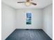 Comfortable bedroom with neutral paint and carpet, a ceiling fan and natural light at 610 Shepard School Rd, Zebulon, NC 27597