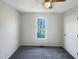 A cozy bedroom featuring carpet, a ceiling fan, and a closet with a door at 610 Shepard School Rd, Zebulon, NC 27597