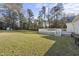 The backyard is spacious with a deck and lawn at 63 Halter Ct, Angier, NC 27501