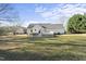 The backyard includes a deck, and above ground pool at 63 Halter Ct, Angier, NC 27501